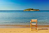 Chair on sandy beach