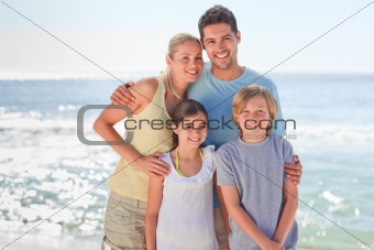 Joyful family at the beach