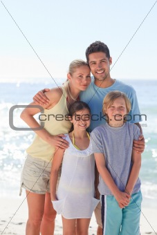 Joyful family at the beach