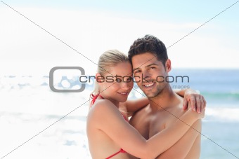 Lovely woman in her boyfriend's arms