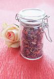 Dried rose petals in a jar