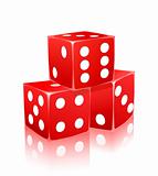 red dice with white dots in stack