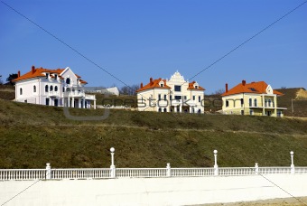 three houses on the slope