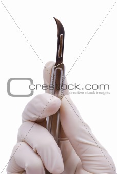 scalpel in his hand