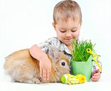 Cute little boy with Bunny and Easter eggs
