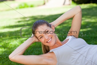 Woman doing her stretches in the park
