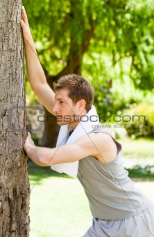 Man doing his stretches in the park