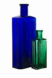 Vintage blue and green medicine bottles