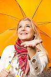 young pretty woman with autumn umbrella
