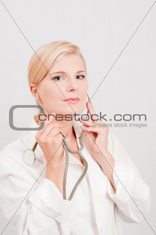 pretty female doctor with medical stethoscope