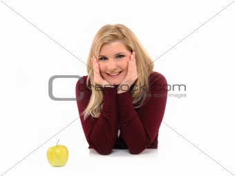 Pretty casual female with green apple. isolated