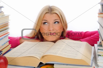 young pretty tired student girl with lots of books in panic.