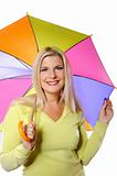 Portrait of pretty autumn woman standing under umbrella.