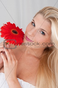 pretty woman with red flower