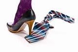 woman's shoe on high heel tread colorful tie