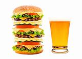 Beer mug and big cheeseburger isolated on white background