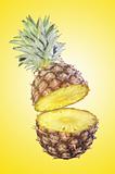 fresh tasty pineapple over yellow background