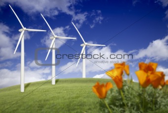 Wind Turbines Against Dramatic Sky, Clouds and California Poppies in the Foreground.
