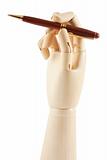 Wooden hand and pen