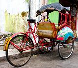 tricycle rickshaws on the streets of Yogyakarta