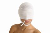 woman with her ??head bandaged with cigarette