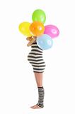 pregnant woman hid behind balloons