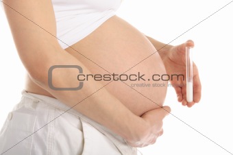 pregnant woman holding a test tube with sperm