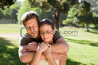 Man hugging his beautiful wife