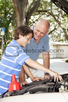 Father Teaches Son to Fix Car