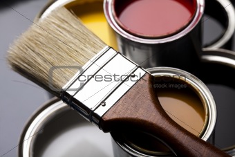 Paint brush and cans