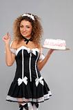beautiful waitress with a cake on a tray