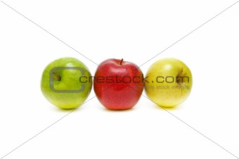 apples of different colors closeup on white background