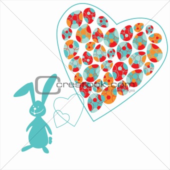 The small bunny and colorful Easter eggs in heart on a orange background