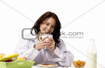 young laughing woman at breakfast