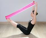 pilates yoga resistance band red rubber gym woman