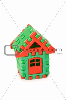 Small toy house isolated on the white