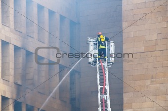 Firefighter at the fire in the city center
