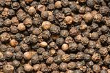 Background of black pepper - extreme close up