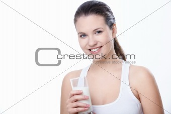 Young girl with a glass of milk