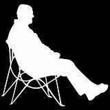 man sitting on black background