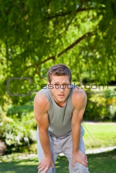 Sporty handsome man in the park