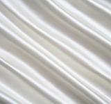 Smooth elegant white silk can use as wedding background Smooth e