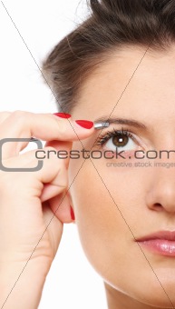 Woman with tweezers