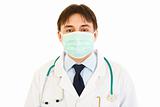 Medical doctor in mask and with stethoscope
