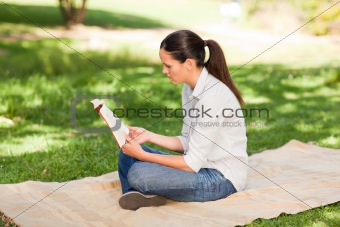 Woman reading in the park