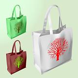 vector set of three reusable bags with a tree silhouette