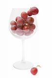red grapes in a wine glass