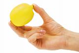 yellow lemon in male hand