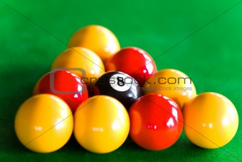 Close-up of billiard balls dispsed in triangle
