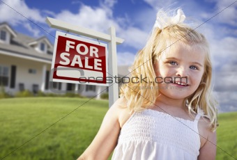 Cute Smiling Girl in Yard with For Sale Real Estate Sign and House